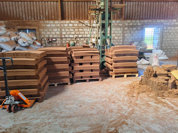 Coco Peat Bricks near Press Machine
