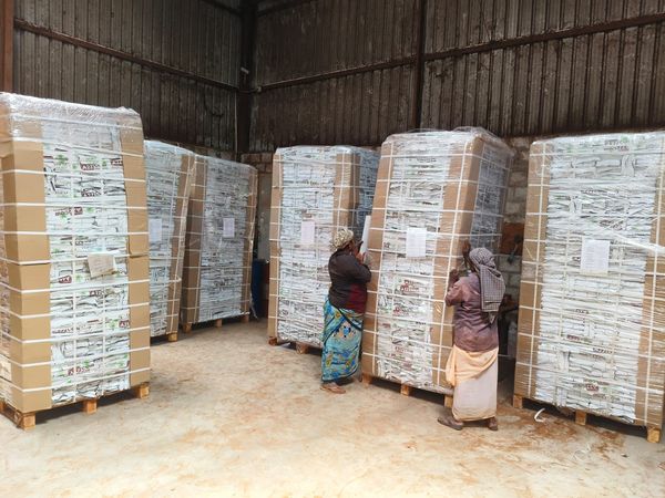 Workers with Coco Peat Pallets